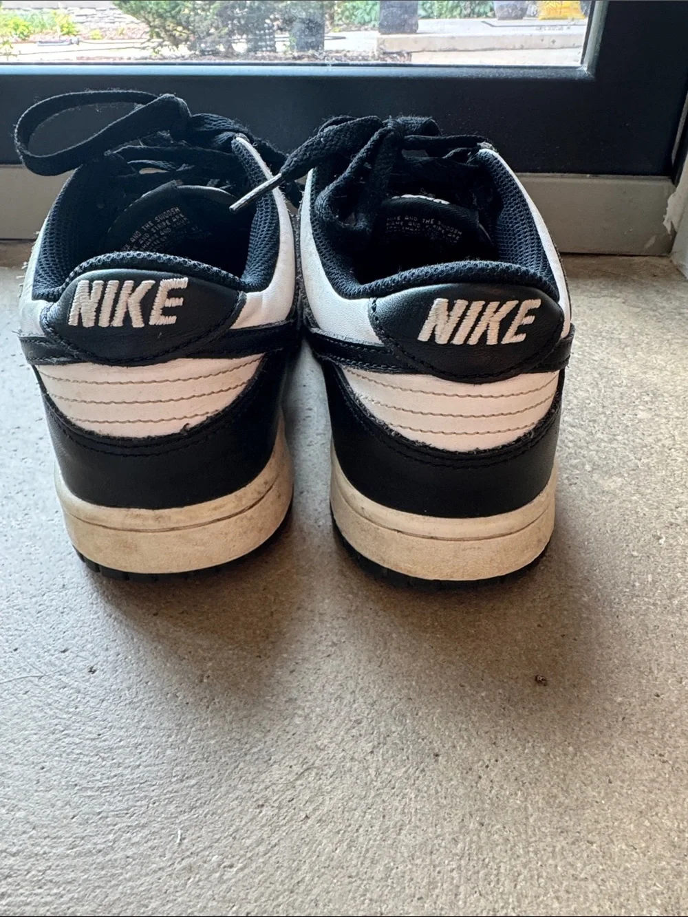 Nike Black and White Low-Top Sneakers with Classic Swoosh